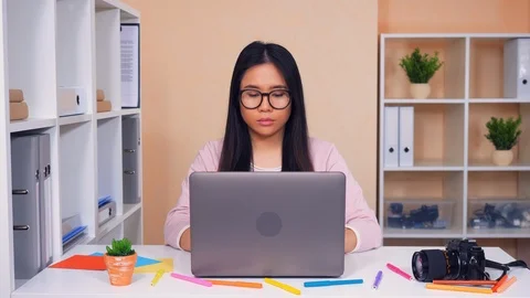 Happy girl posing at work Stock Footage 88310911