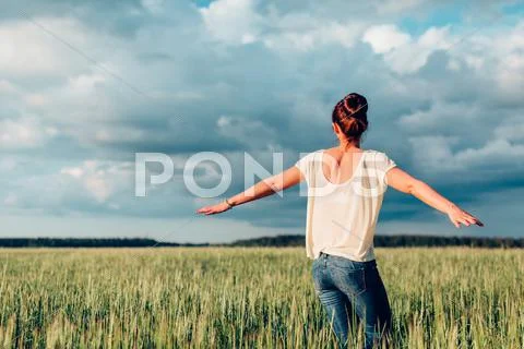 Happy girl spinning in dance Stock Photos