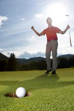 Happy golf player cheering. Foto stock