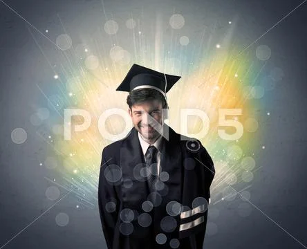 Happy graduate with colorful bokeg lights in the background Stock Photos