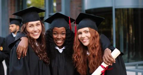 Happy group of mature students on graduation day embracing with each other Stock Photos