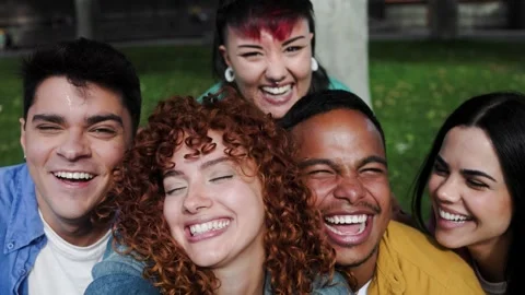 Happy group of people taking self picture smiling at camera at park city Stock Footage 286852945