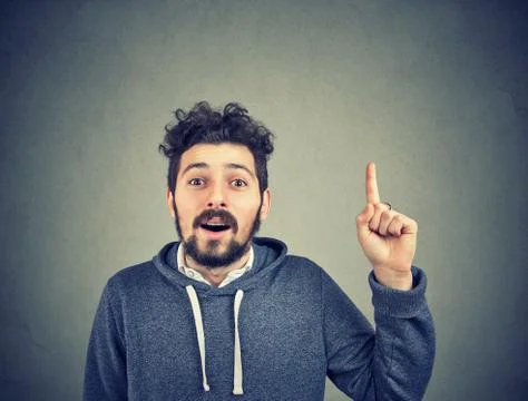 Happy guy having bright idea Stock Photos