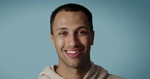 Happy guy posing camera after beauty routine. Smiling man touching head Stock Footage 221995897
