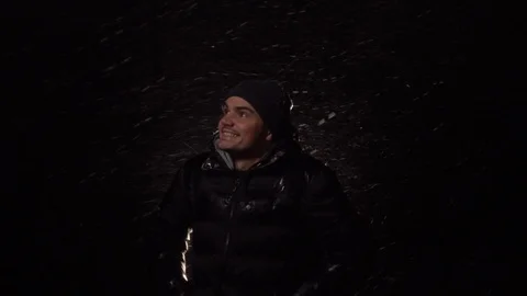 Happy guy smiling young man. Heavy snow. Man looking in different directions Stock Footage 122295933