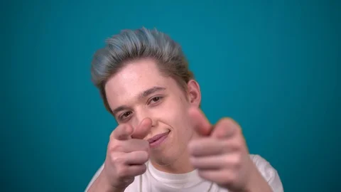 Happy guy snap finger clicks hand show to camera, portrait positive man Stock Footage 128761441