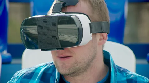Happy guy in VR glasses Stock Footage 63840901