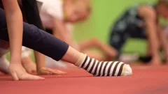 Flexible young gymnast girl stretching d, Stock Video