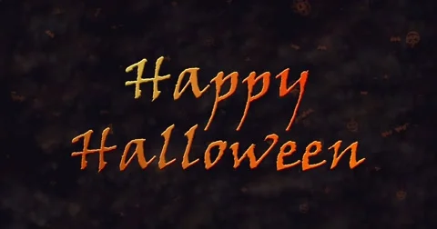 Happy Halloween text dissolving into dust to bottom Stock Footage 68689818