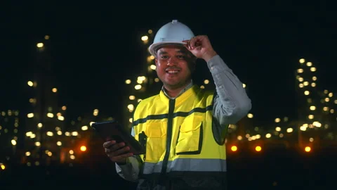 Happy handsome Asian man engineer with digital tablet looking at camera. Stock Footage 270460811