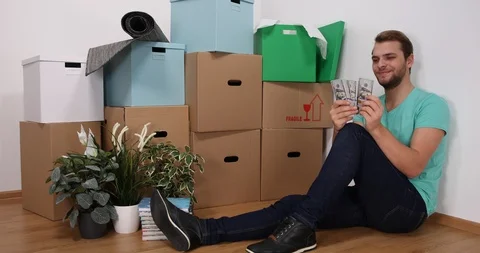 Happy Handsome Man Count Usd Bills Dollars Cash Salary Money Earned Indoors Home Video stock 85536257