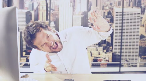 Happy handsome man at work in office listening music singing retro style Stock Footage 49282231