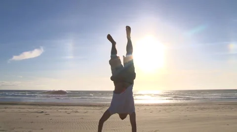 Happy Handstand Man at Beach Video stock 38722140