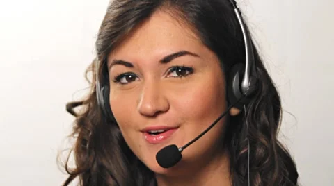 Happy helpful customer service worker talking into headset Stock Footage 8518640