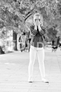Happy hiding game outdoors. Hide and seek urban background. Happy childhood Stock Photos