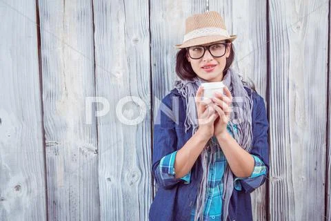 Happy Hipster Holding A Cup In Her Hand