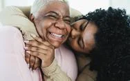 Happy Hispanic Mother And Daughter Having Tender Moment Together Stock Photos