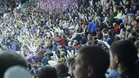 Happy hockey fans huge crowd cheer sportsmen on tribunes Stock Footage