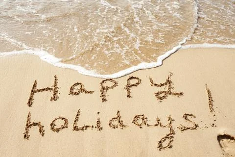 Happy holidays on beach Stock Photos