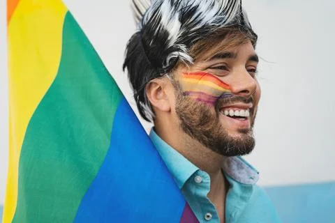 Happy homosexual man having fun celebrating gay pride festival day Stock Photos