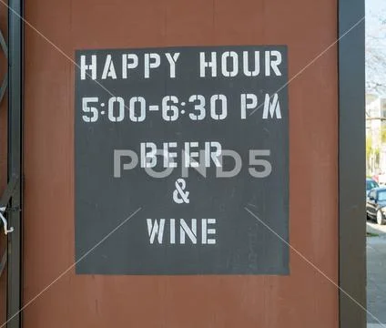 Happy hour, wine and beer, sign outdoors Stock Photos
