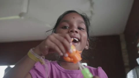 Happy Indian Child Making Bubbles and Laughing Stock Footage 57972415