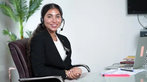 Happy indian service support operator or agent woman wearing headset lookin.. Stock Footage 295014281