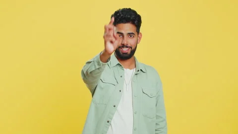 Happy Indian smiling man pointing finger to camera making winner choice, showing Stock Footage 266755964