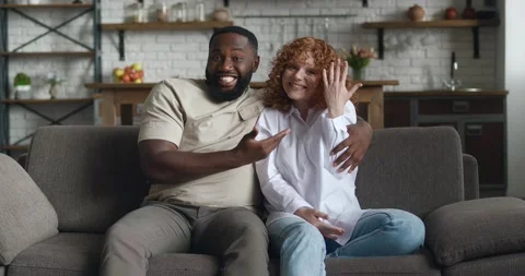 happy interracial couple sharing Stock Video Pond5