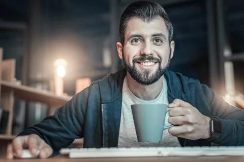 Happy IT guy studying programming language 스톡 사진