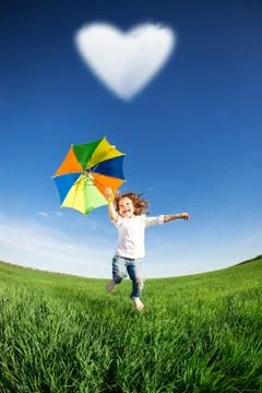 Happy kid jumping Stock Photos