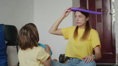A happy kid learns speech with a private female therapist. Fun and educational Stock Footage 250152820