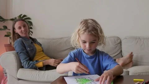 Happy kid son drawing having fun with mother at home living room - Family Stock Footage 234144018