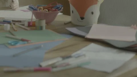 Happy kids having fun while drawing on paper at home Stock Footage 99991606