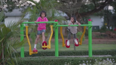 Happy kids playing in playground  스톡 동영상 143201343