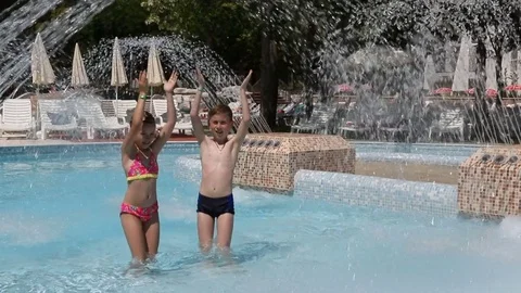 Happy kids in the pool Stock Footage 70122655