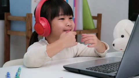 Happy kids study online interactively with laptop computer or homeschooling Stock Footage 235790874