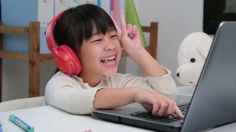 Happy kids study online interactively with laptop computer or homeschooling Stock Footage 235791587