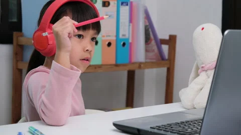 Happy kids study online interactively with laptop computer or homeschooling Stock Footage 235794244