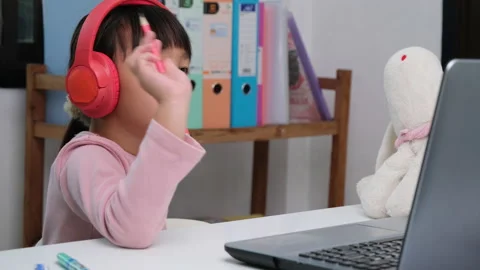 Happy kids study online interactively with laptop computer or homeschooling Stock Footage 235794621