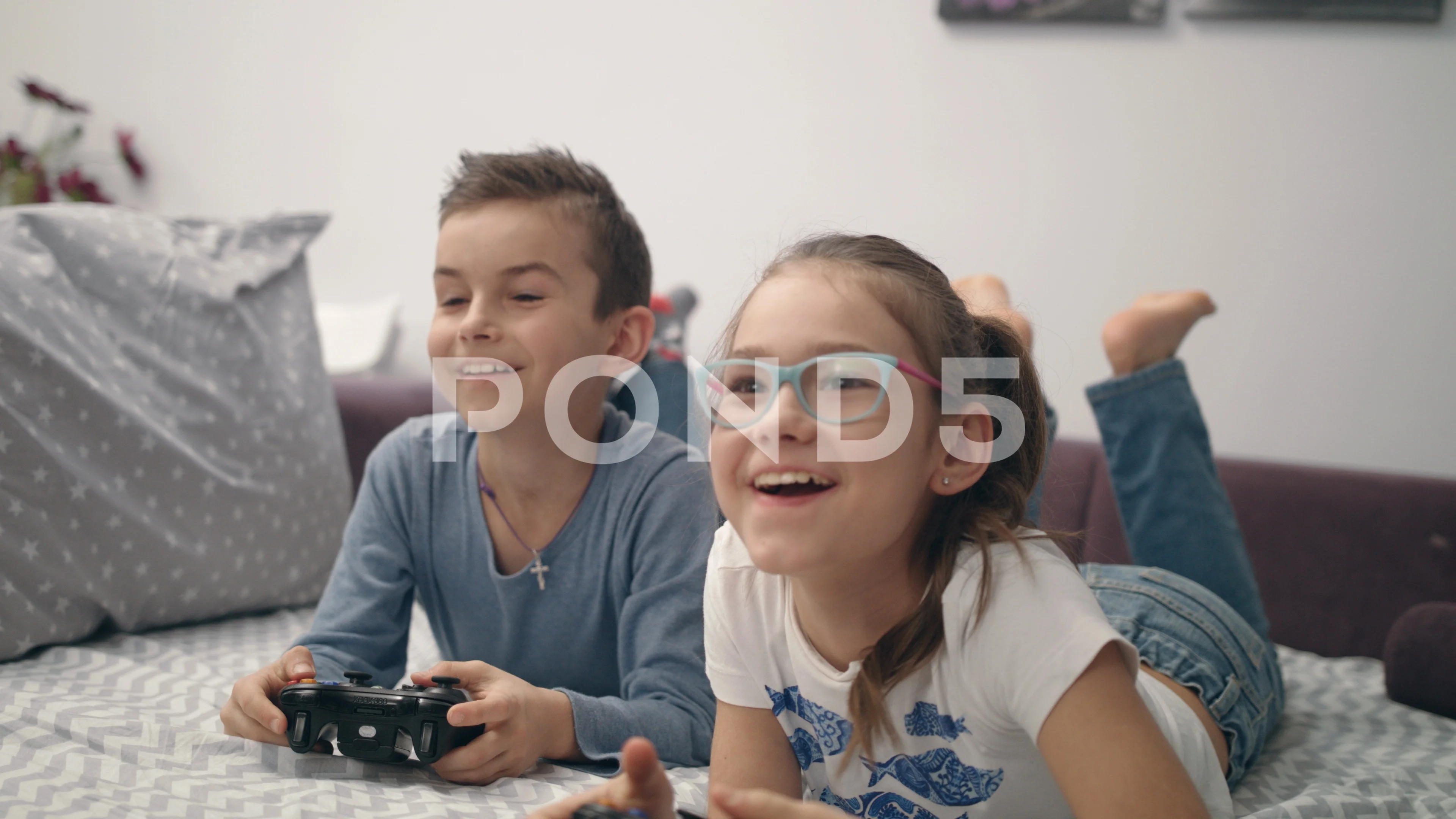 Kids playing video games Stock Photos, Royalty Free Kids playing