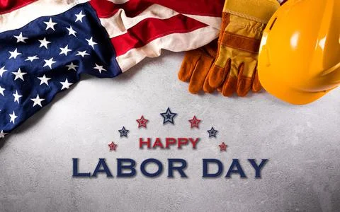 Happy Labor day concept. American flag with different construction tools on d Stock Photos