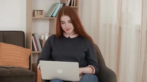 Happy lady chatting on computer surfing browsing internet social media, working  Stock Footage 148752366