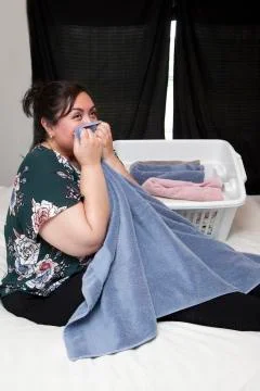 Happy lady with laundry Stock Photos