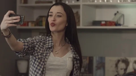 Happy lady make fun V-selfie home. Video stock 73486193