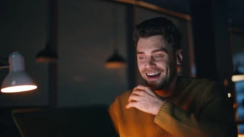 Happy late worker videocalling talking to laptop web camera closeup smiling 스톡 동영상 340115146