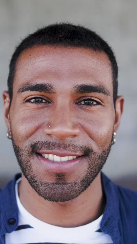 Happy Latin man smiling in front of camera - Young male lifestyle concept - Stockbeeldmateriaal 335351455