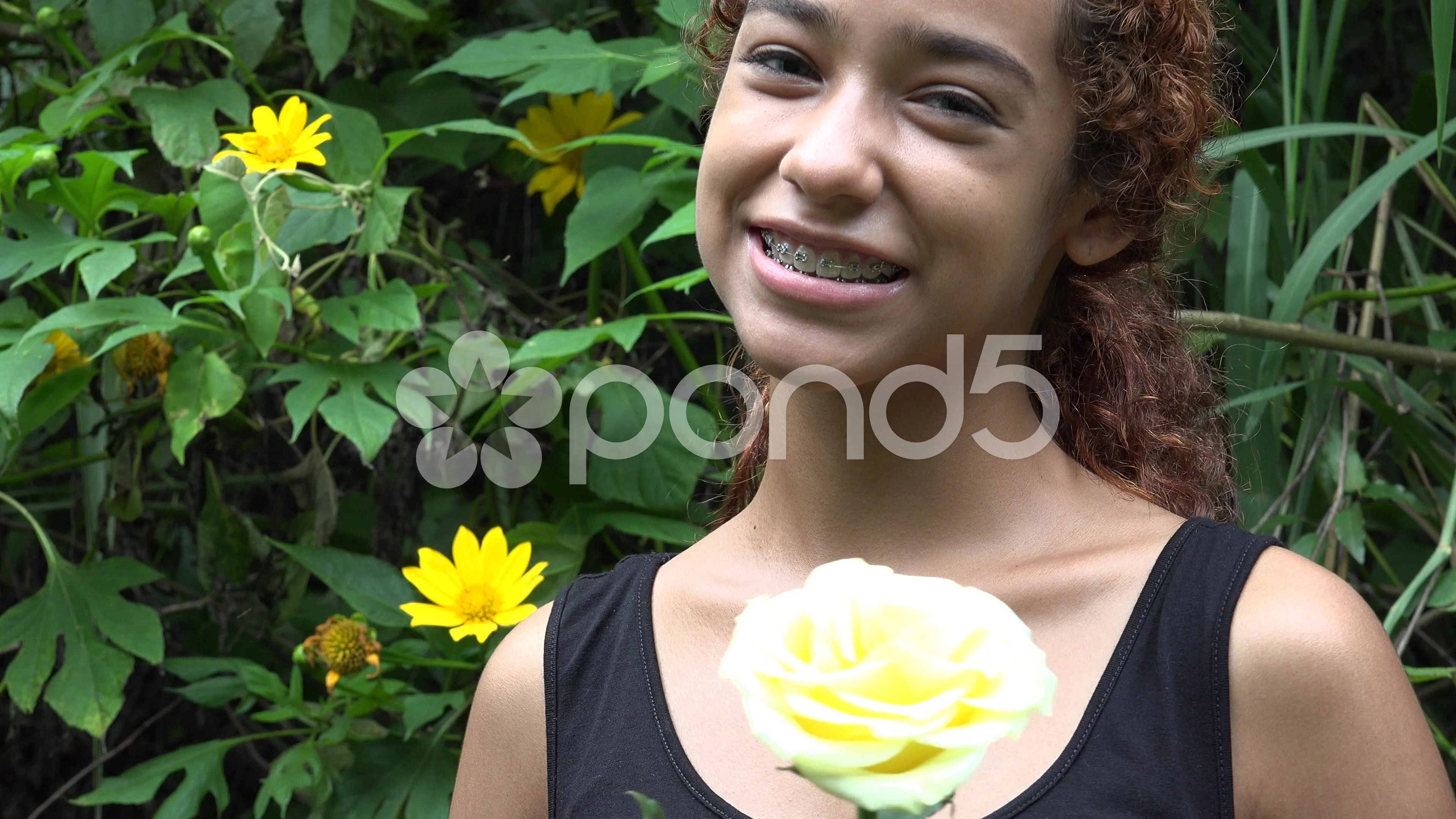 Happy Latina Girl with Braces | Stock Video | Pond5