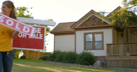 Happy lesbian couple doing a dance outside their new house Stock-Footage 88370500