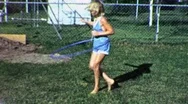 Happy Little Girl Blond Hula Hoop Exercise Fun 60S Vintage Film Home Movie  Stock Footage